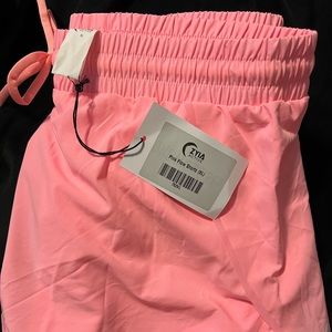 Brand new ZYIA pink flow shorts.